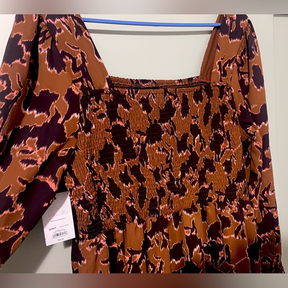 Nine West XL Dress! It fits like an XL or Bigger as well. It has lots of stretch